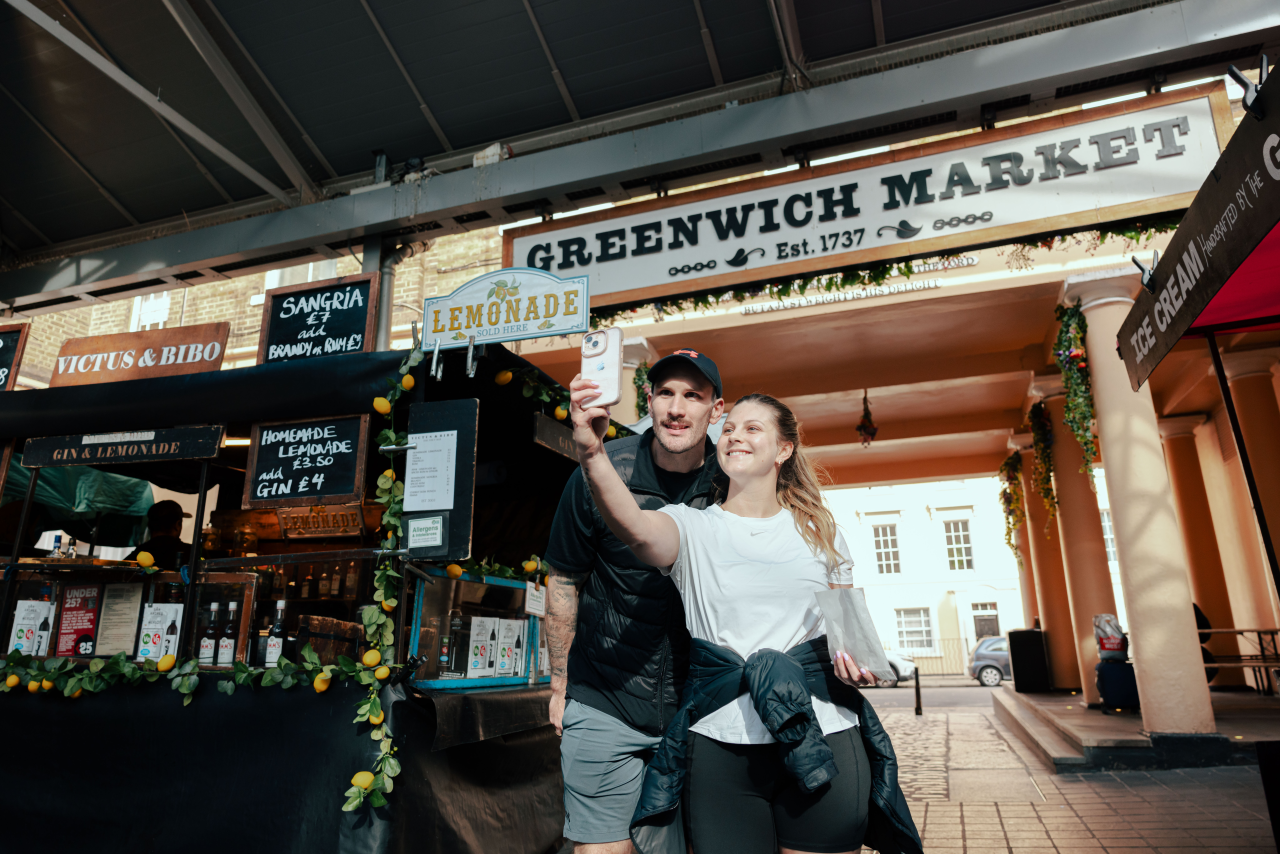 Two people taking a selfie at Greenwich Market